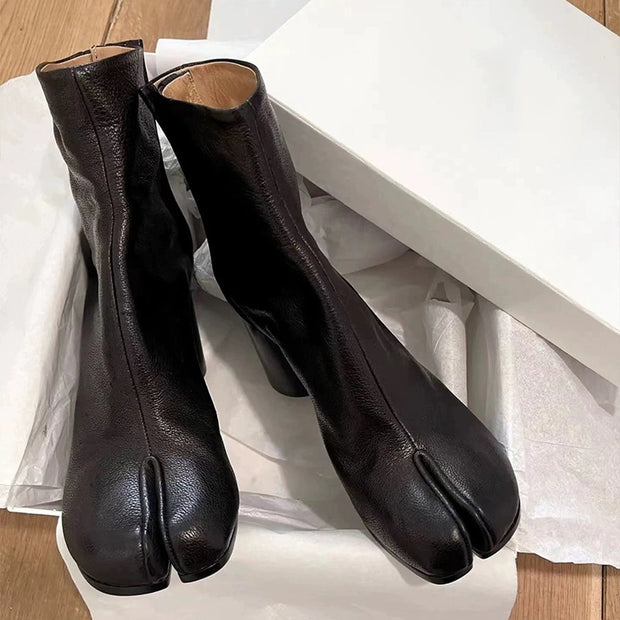 Black leather split toe women's boots in a box