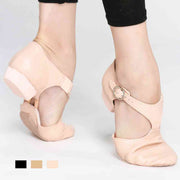 Soft sole ballet shoes demonstrating foot arch