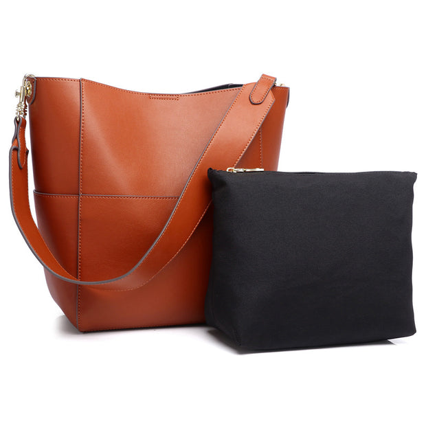 Brown leather bucket bag with black pouch