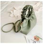 Green bucket shoulder handbag with adjustable strap