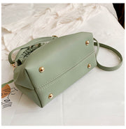 Bottom view of green PU shoulder handbag with gold studs