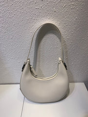 White crescent leather bag with long strap