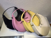 Collection of crescent leather bags in various colors