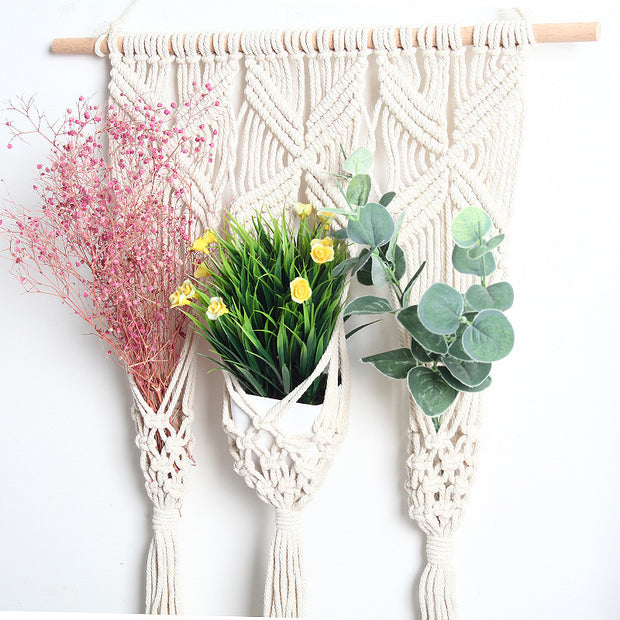 Close-up of woven tapestry rack with floral decor