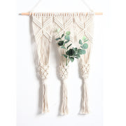 Bohemian woven tapestry rack with eucalyptus leaves