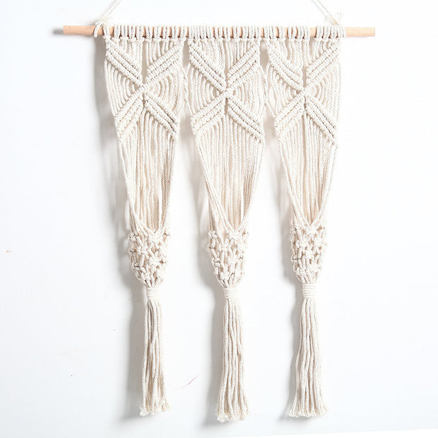 Woven tapestry rack with intricate bohemian design