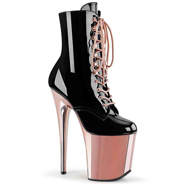 Black and pink glossy high heel boots