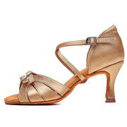 Gold Latin dance shoe with elegant straps