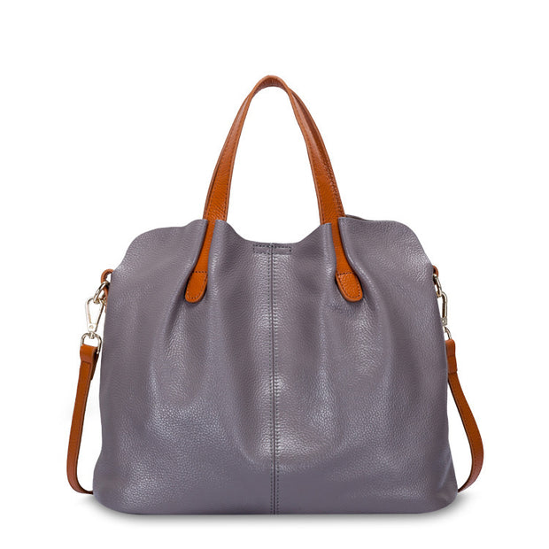 Gray soft leather tote bag with brown handles