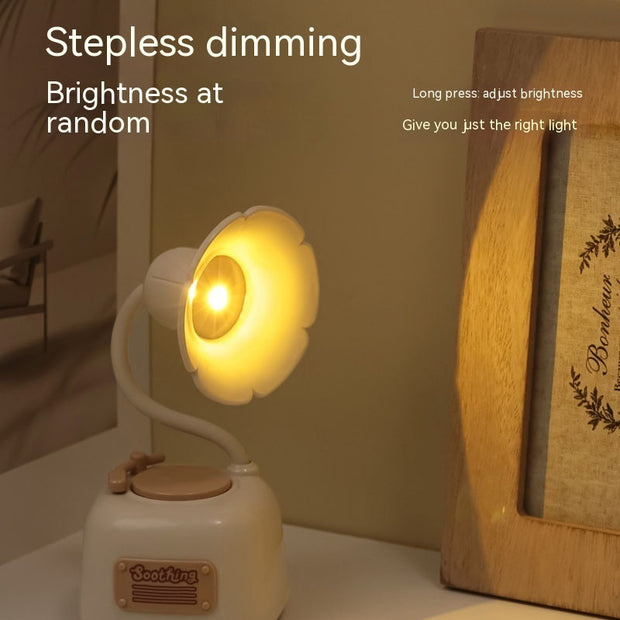 Retro phonograph lamp with stepless dimming on a desk