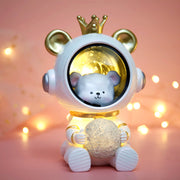 Children's star light with a bear-themed design, golden crown, and glowing moon, ideal for a celestial-themed room.