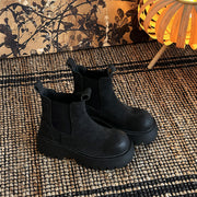 Pair of black chunky sole Chelsea boots