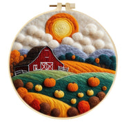 Pumpkin field wool felt painting with barn and sunset