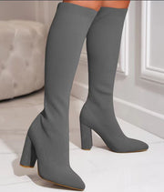 Gray knee high sock boots with block heels