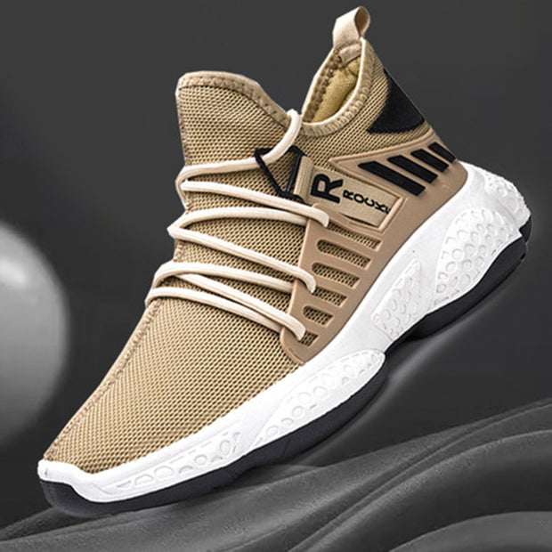 Beige breathable mesh sports shoe with black details.