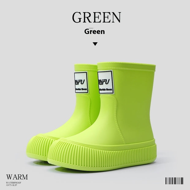 Green platform rain boots with logo detail