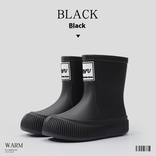 Black platform rain boots with logo detail