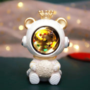 Bear-themed children's star light with a golden crown and glowing starry globe, adding celestial charm to a child's room.