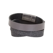 Gray leather bracelet with metal clasp and tracery