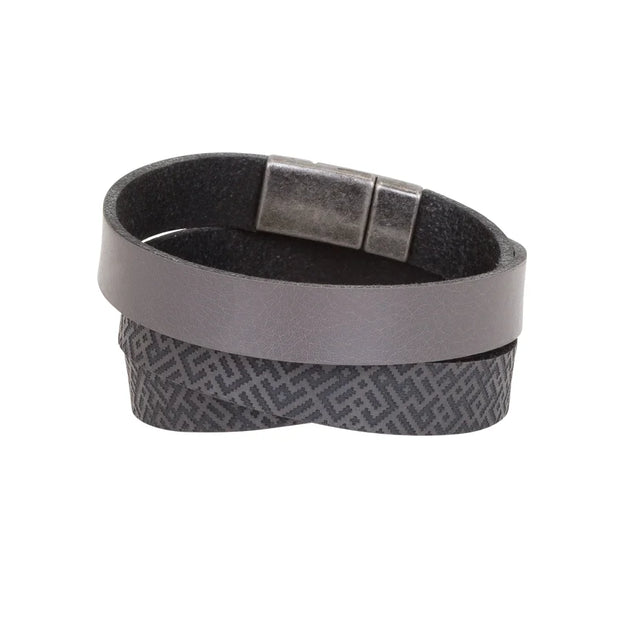 Gray leather bracelet with metal clasp and tracery