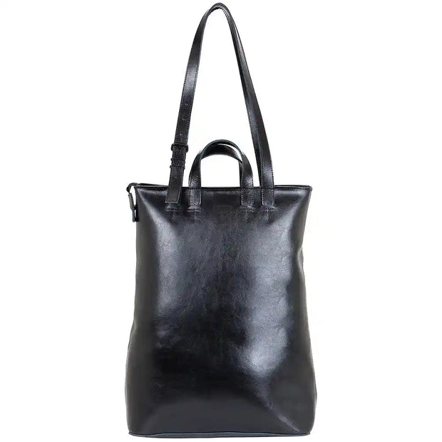 Front view of black structured leather tote bag with minimalist design, sturdy handles, and spacious interior for daily essentials.