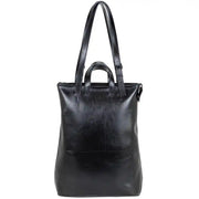 Back view of black structured leather tote bag with smooth finish, sturdy handles, and adjustable strap for everyday use.