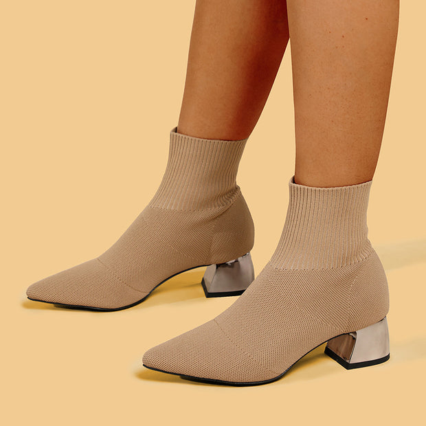 Apricot chunky heel knitted boots on feet