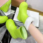 Green platform rain boots with fur lining