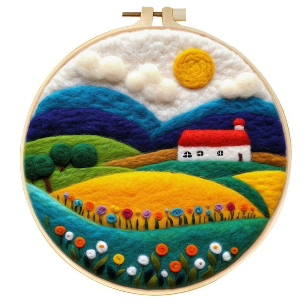 Colorful landscape wool felt painting with house and fields